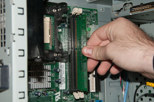 Inserting RAM chip into slot