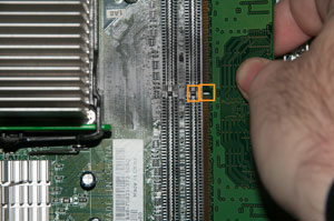 Close up of middle notch of RAM chip and slot